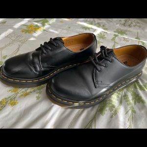 These are classic black leather Dr. Martin shoes in a (US) woman’s size 6.